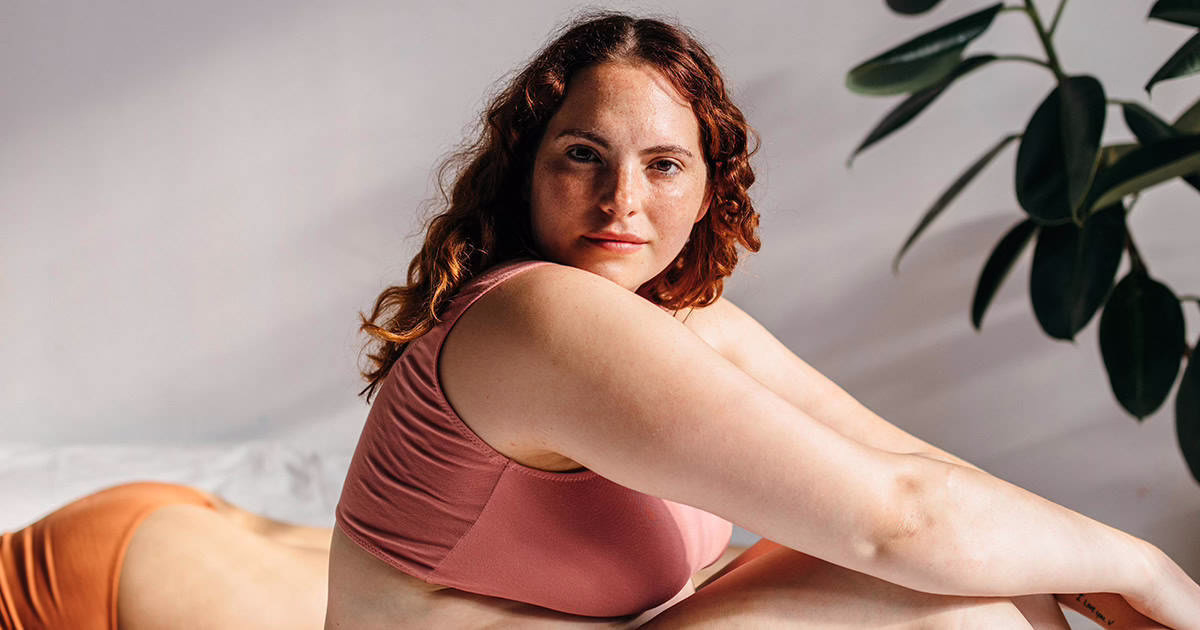 Confident young woman looking at camera