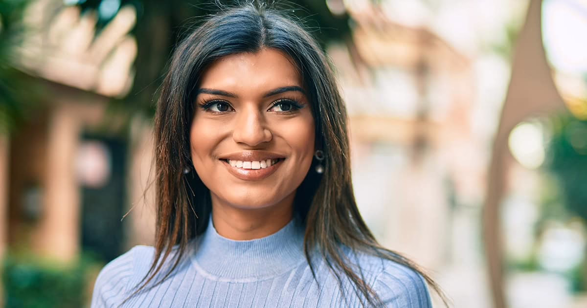 Confident young woman looking at camera