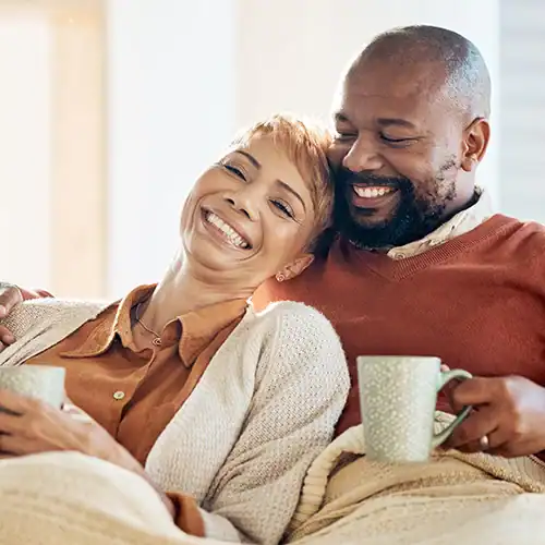 Couple relaxing on the couch together